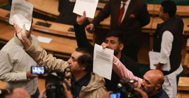 Legislators hold papers calling for bringing amendments in the resolution on the restoration of the special status of Jammu and Kashmir, in Srinagar, Kashmir, India, Nov. 7, 2024. (EPA Photo)
