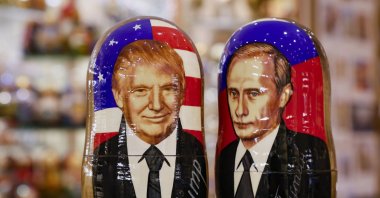 Traditional Russian Matryoshka wooden dolls, also known as nesting dolls, depicting US Republican presidential candidate Donald J. Trump (L) and Russian President Vladimir Putin (R), are on display at a gift shop in Moscow, Russia, Nov. 6, 2024. (EPA Photo)