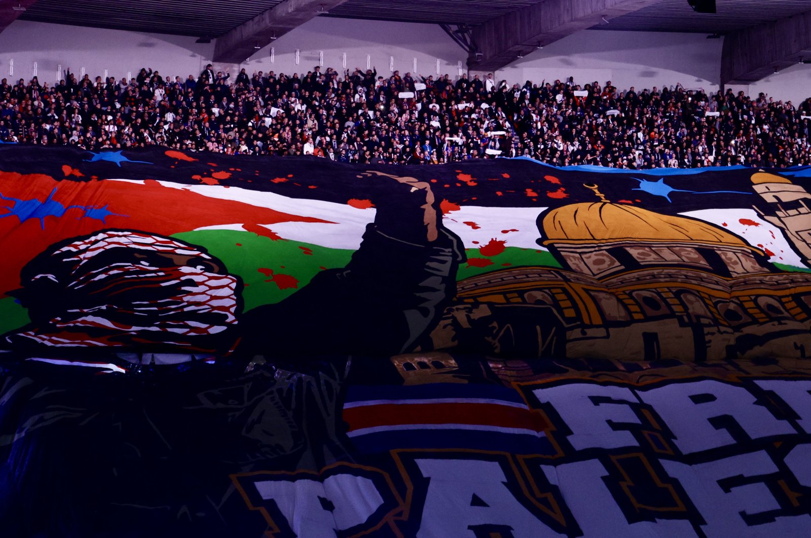 PSG fans&#039; &#039;Free Palestine&#039; banner shows before Champions League match against Atletico Madrid at the Parc des Princes, Paris, France, Nov. 7, 2024. (AA Photo)