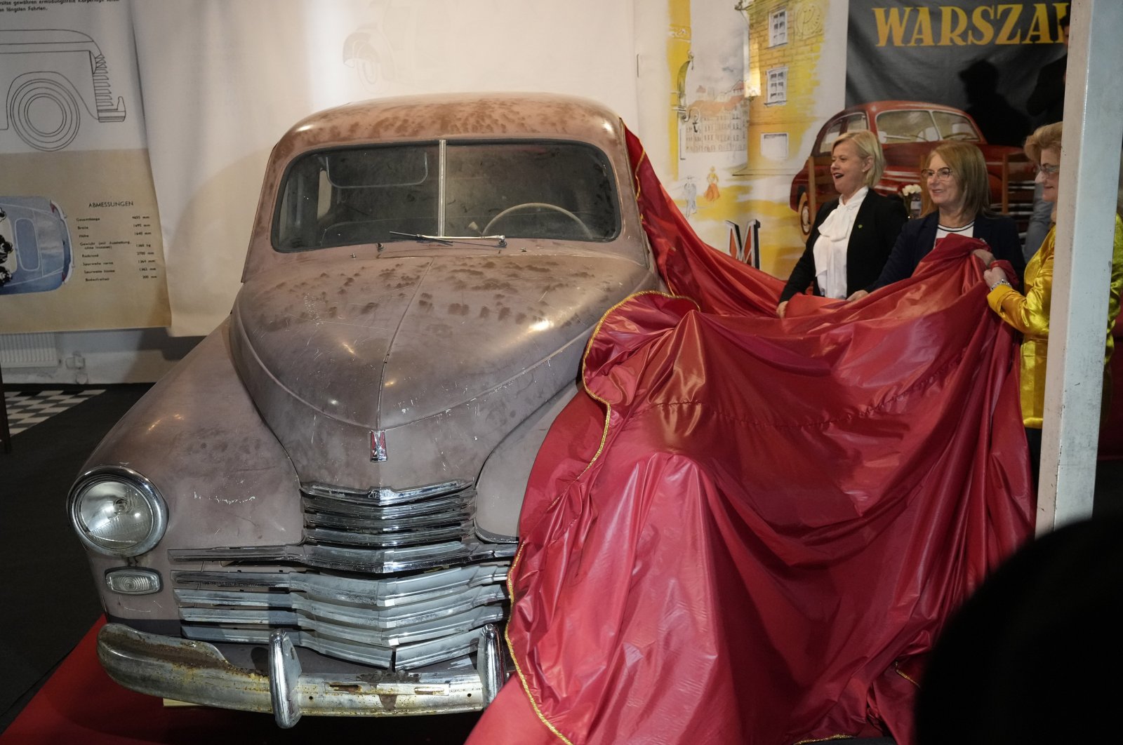 This Warszawa M-20, the first vehicle to leave a car factory in Poland after World War II, is now on public display at a private museum in Otrebusy, central Poland, Nov. 6, 2024. (AP Photo)