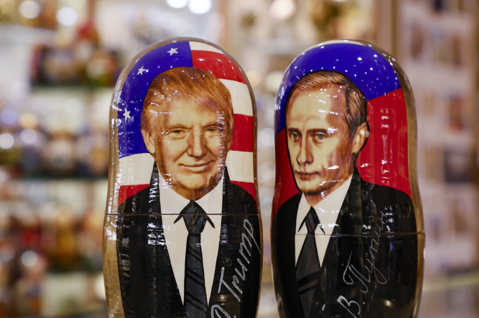 Traditional Russian Matryoshka wooden dolls, also known as nesting dolls, depicting US Republican presidential candidate Donald J. Trump (L) and Russian President Vladimir Putin (R), are on display at a gift shop in Moscow, Russia, Nov. 6, 2024. (EPA Photo)