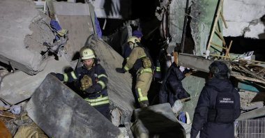 Rescuers work at a site of an apartment building hit by a Russian airstrike, Kharkiv, Ukraine, Nov. 8, 2024. (Reuters Photo)