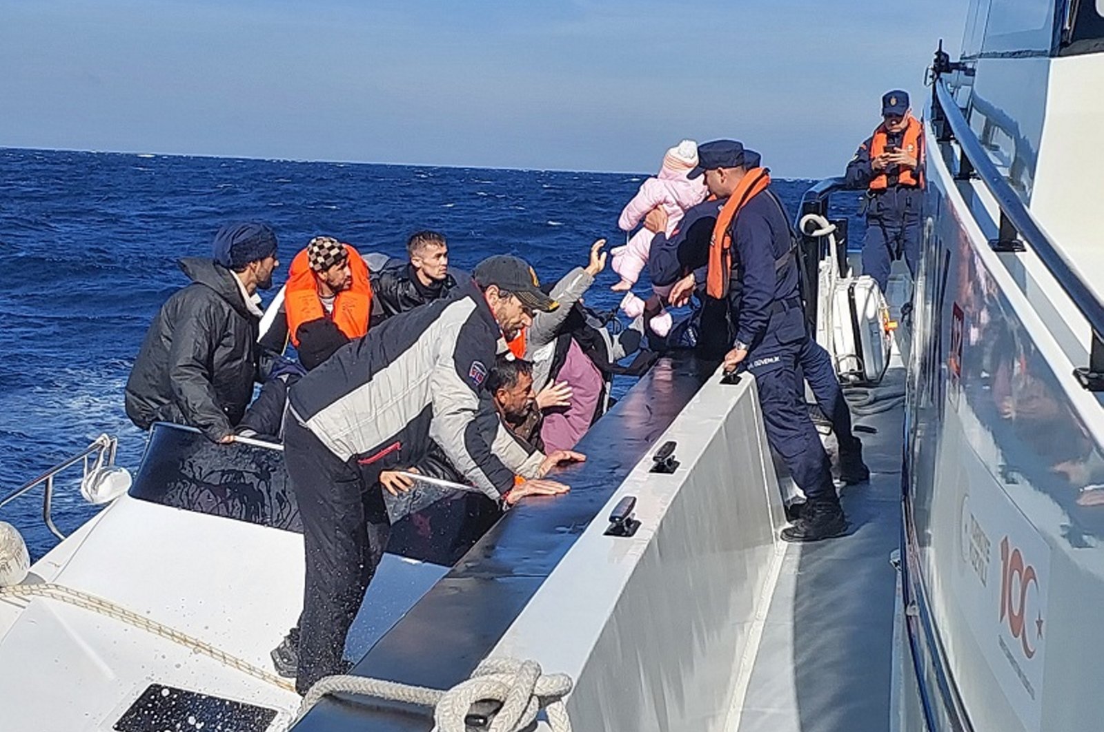 Turkish coast guard vessel picks up a group of irregular migrants off the coast of western Çanakkale province, Türkiye, Nov. 2, 2024. (AA Photo)