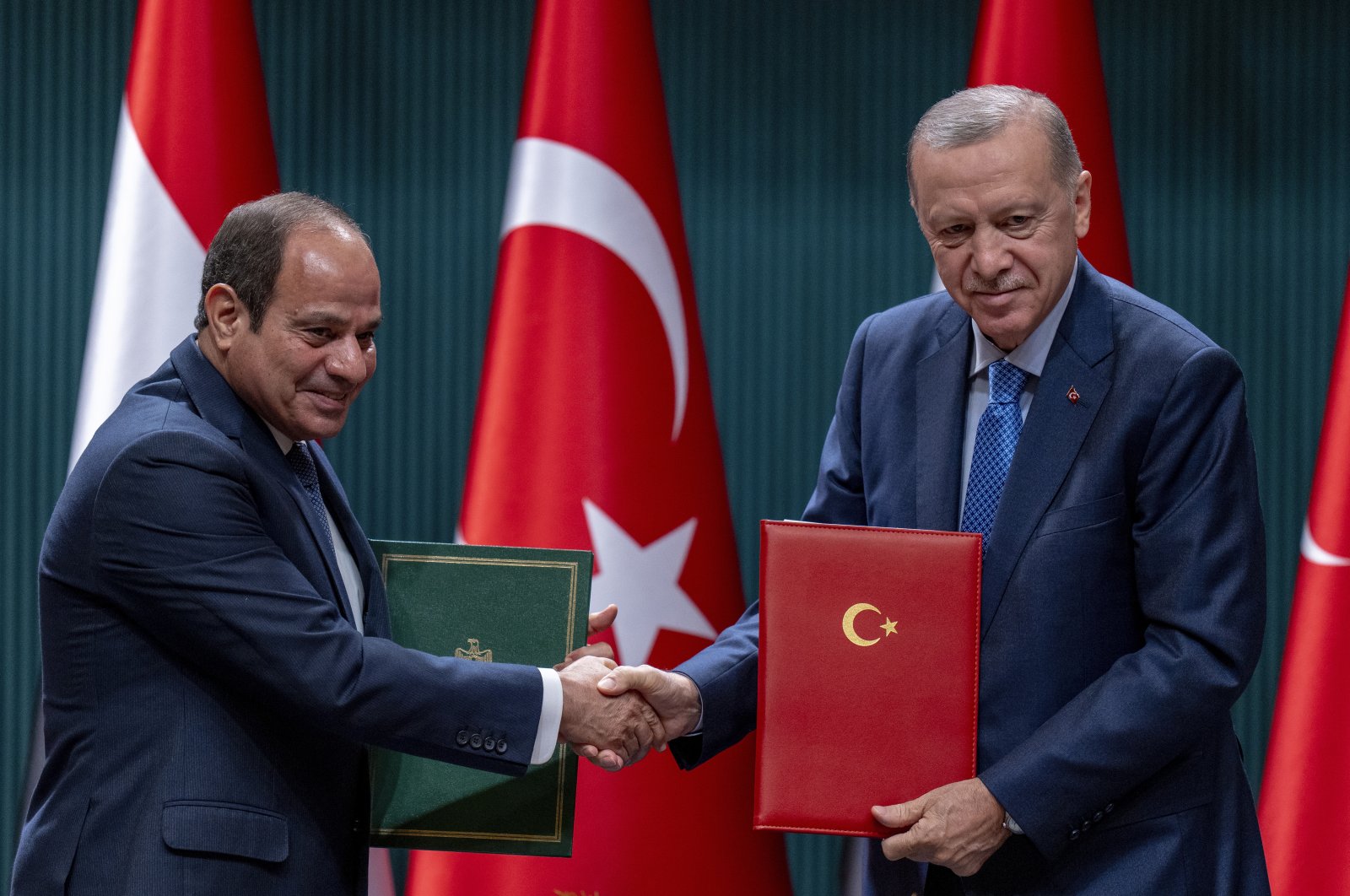 President Recep Tayyip Erdoğan and Egyptian President Abdel Fattah el-Sissi pose during a bilateral signature agreements ceremony in Ankara, Türkiye, Sept. 4, 2024. (AP Photo)