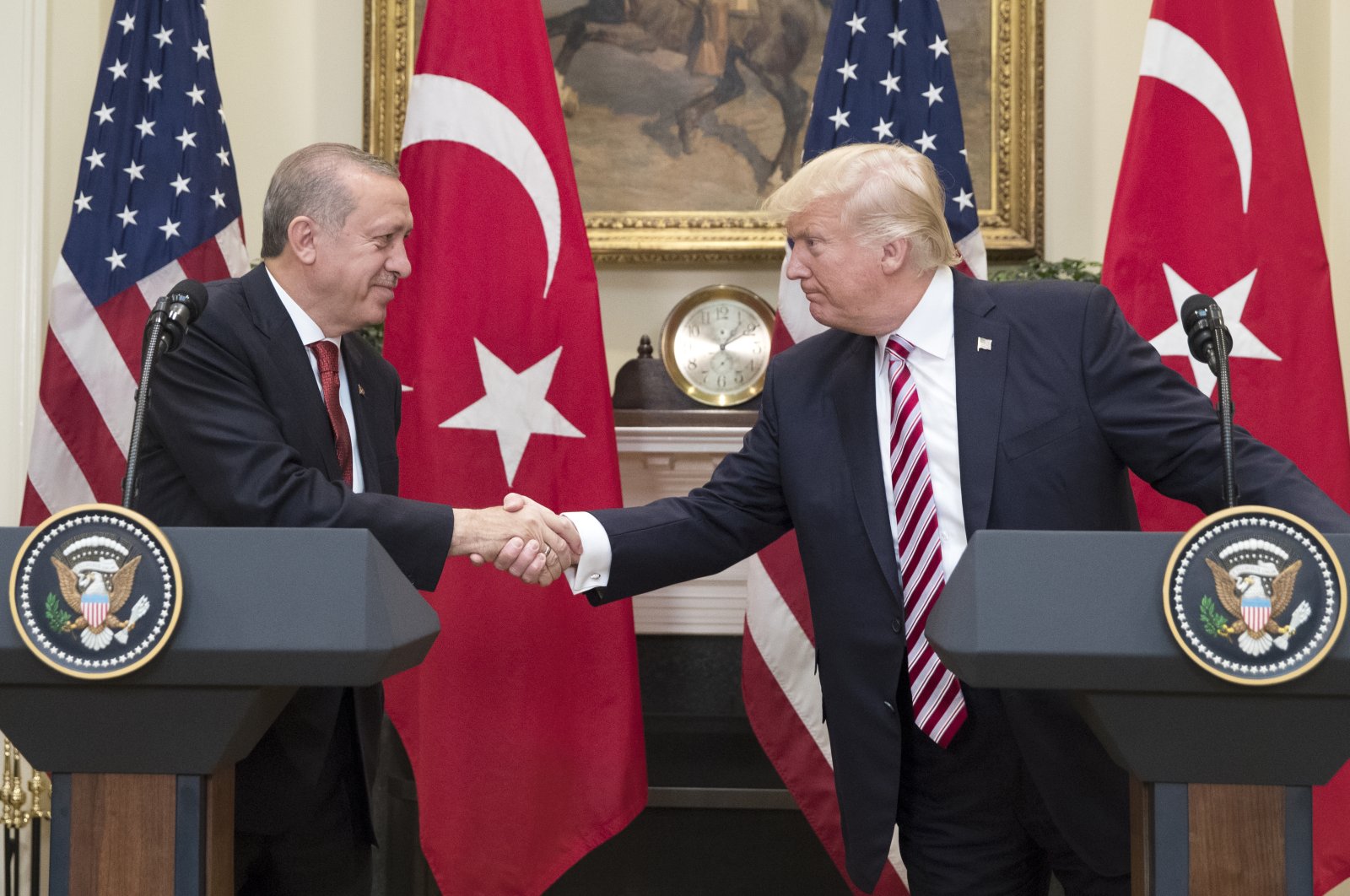 U.S. President Donald Trump (R) shakes hands with President Recep Tayyip Erdoğan in the Roosevelt Room where they issued a joint statement, at the White House, in Washington, D.C., U.S., May 16, 2017. (Getty Images Photo)