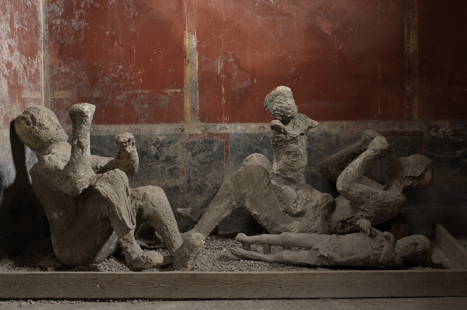 This image provided by the Archeological Park of Pompeii shows a group of casts, numbers 50, 51 and 52, made in 1974 from the Casa del Bracciale d'Oro in Pompeii. (Courtesy of MIC, Archaeological Park of Pompeii via AP)