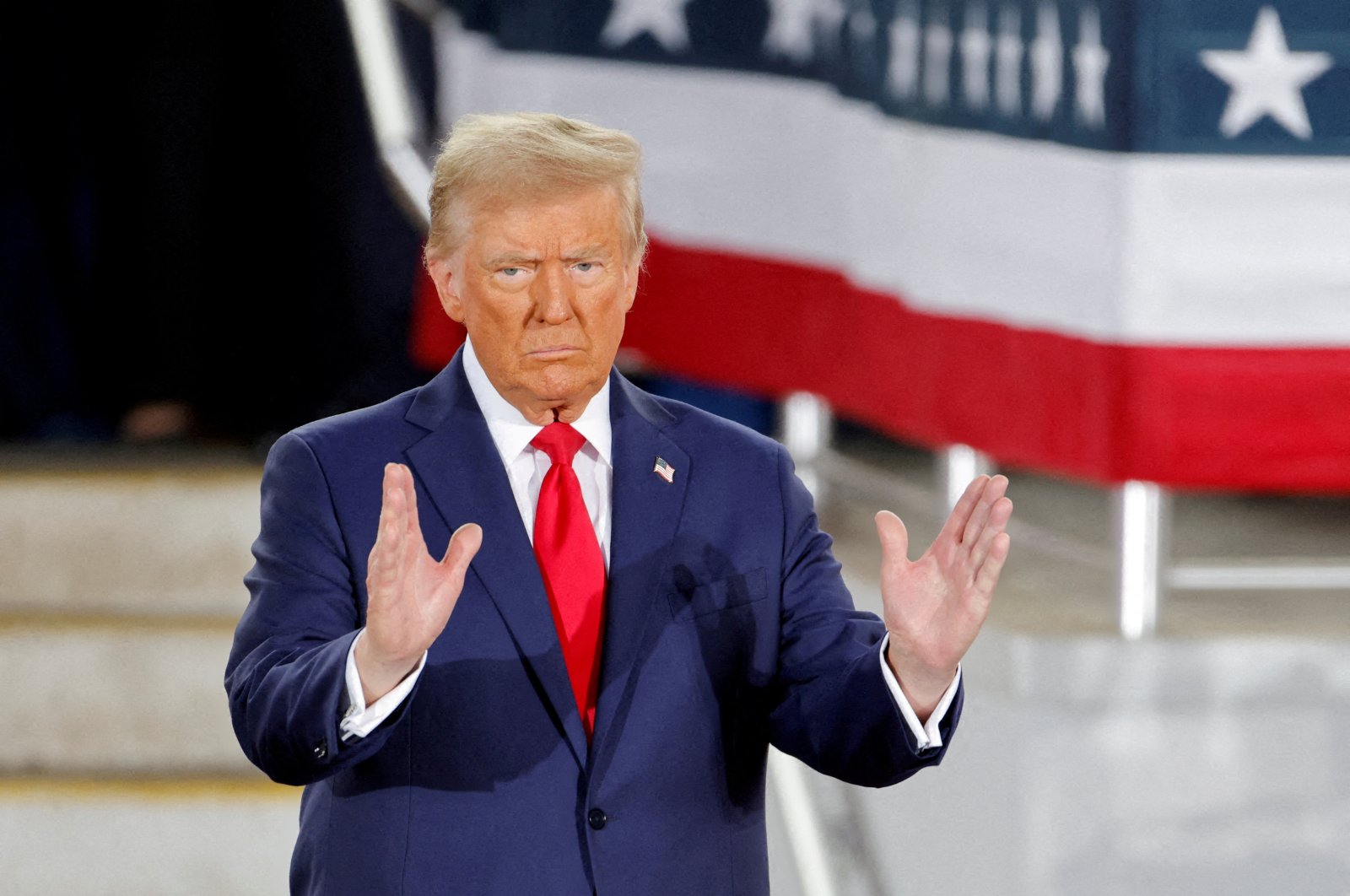 Republican then-presidential candidate and former U.S. President Donald Trump gestures during a campaign event at Dorton Arena, in Raleigh, North Carolina, U.S. Nov. 4, 2024.   (Reuters File Photo)