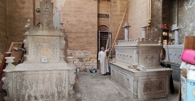 A man stands inside the tomb of the el-Meligy family prior to its demolition in a historic Cairo cemetery that will be partially razed to accommodate the growing mega-city, Cairo, Egypt, Nov. 6, 2024. (AFP Photo)