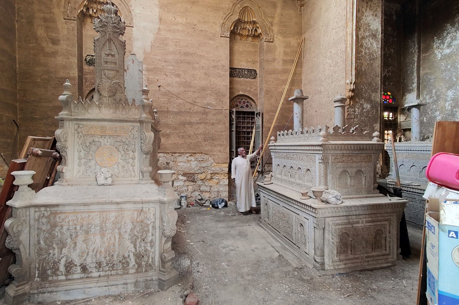 A man stands inside the tomb of the el-Meligy family prior to its demolition in a historic Cairo cemetery that will be partially razed to accommodate the growing mega-city, Cairo, Egypt, Nov. 6, 2024. (AFP Photo)