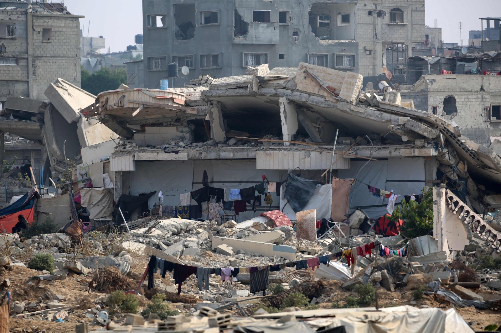 A view of a severely damaged house used as a shelter by displaced Palestinians, in the al-Bureij refugee camp in the central Gaza Strip, Palestine, Nov. 10, 2024. (AFP Photo)