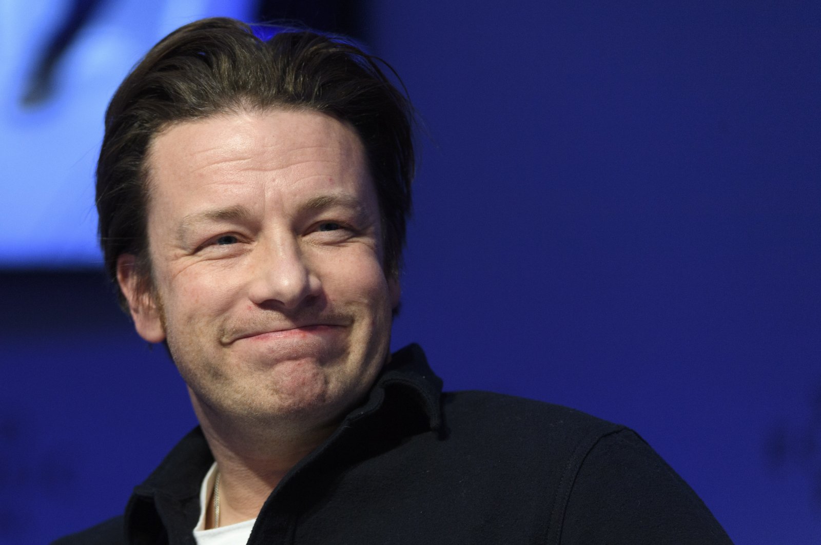 British chef Jamie Oliver attends a panel session during the 47th annual meeting of the World Economic Forum in Davos, Switzerland, Jan. 18, 2017. (AP Photo)