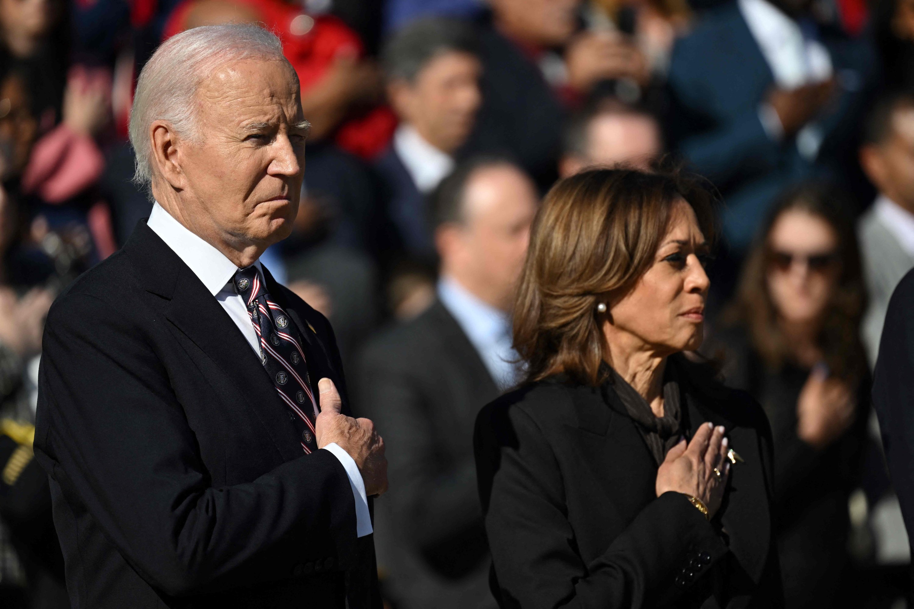 US President Joe Biden (L) and Vice President Kamala Harris stand at attention during a wreath-laying ceremony at The Tomb of the Unknown Soldier at Arlington National Cemetery to mark Veterans Day, Arlington, Virginia, U.S., Nov. 11, 2024. (AFP Photo)