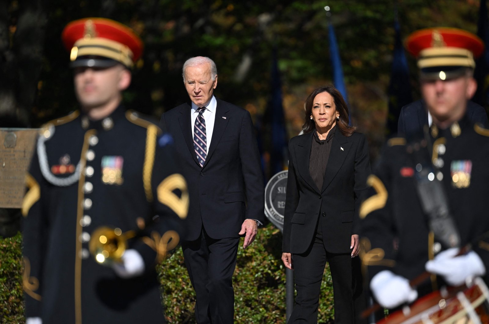 U.S. President Joe Biden (L) and Vice President Kamala Harris arrive for a wreath-laying ceremony at The Tomb of the Unknown Soldier at Arlington National Cemetery to mark Veterans Day, Arlington, Virginia, U.S., Nov. 11, 2024. (AFP Photo)