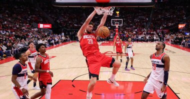 Alperen Şengün of the Houston Rockets dunks the ball over Alexandre Sarr of the Washington Wizards during the second half at Toyota Center, in Houston, Texas, U.S., Nov. 11, 2024. (AFP Photo)