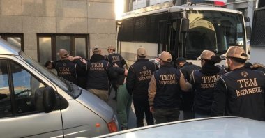 Police officers escort suspected Mossad spies to court, Istanbul, Türkiye, Sept. 18, 2024. (IHA Photo)