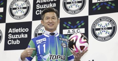 Kazuyoshi Miura poses at a news conference at National Stadium, Tokyo, Japan, June 25, 2024. (AP Photo)