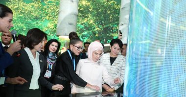 Türkiye&#039;s First Lady Emine Erdoğan (2nd R) and Mehriban Aliyeva (C) at the joint pavilion of the Zero Waste Foundation and the Haydar Aliyev Foundation, Baku, Azerbaijan, Nov. 12, 2024. (DHA Photo)