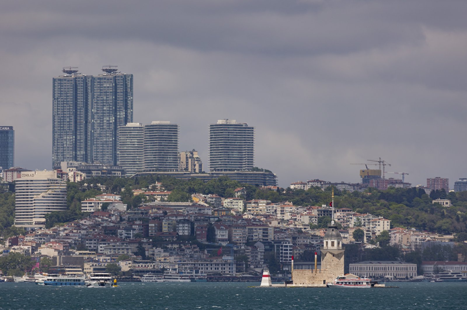 The Maiden&#039;s Tower and the financial area of Levent is seen in the backdrop, Istanbul, Türkiye, April 27, 2024. (Reuters Photo)