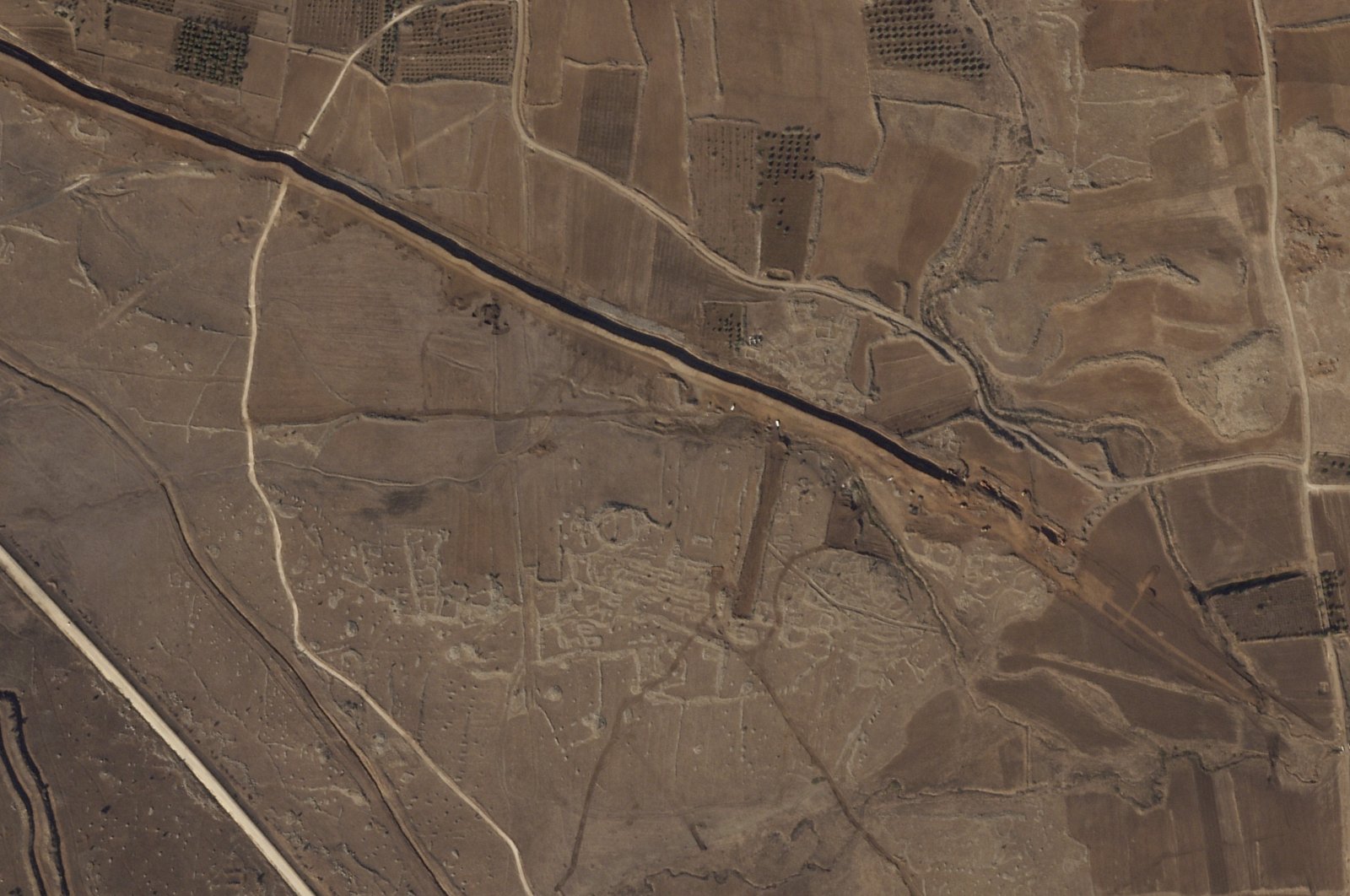 This satellite image from Planet Labs PBC shows Israeli forces digging along the Alpha Line separating the Israeli-occupied Golan Heights from a demilitarized zone in Syria patrolled by United Nations forces, Nov. 5, 2024. (AP Photo)