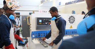 Staff inspect the refurbished metalworking workshop at Pionier Boys' School, in Windhoek, Namibia, Nov. 12, 2024. (AA Photo)