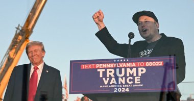 Tesla CEO Elon Musk (R) speaks on stage as he joins former U.S. President and Republican presidential candidate Donald Trump during a campaign rally at the site of the first assassination attempt in Butler, Pennsylvania, U.S., Oct. 5, 2024. (AFP Photo)