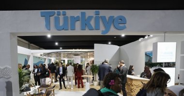 Visitors pass by the Turkish pavilion at the U.N. Climate Change Conference COP29 in Baku, Azerbaijan, Nov. 13, 2024. (EPA Photo)
