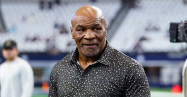 Boxer Mike Tyson on the field before the game between the Dallas Cowboys and New Orleans Saints at AT&amp;T Stadium, Arlington, Texas, U.S., Sept. 15, 2024. (Reuters Photo)