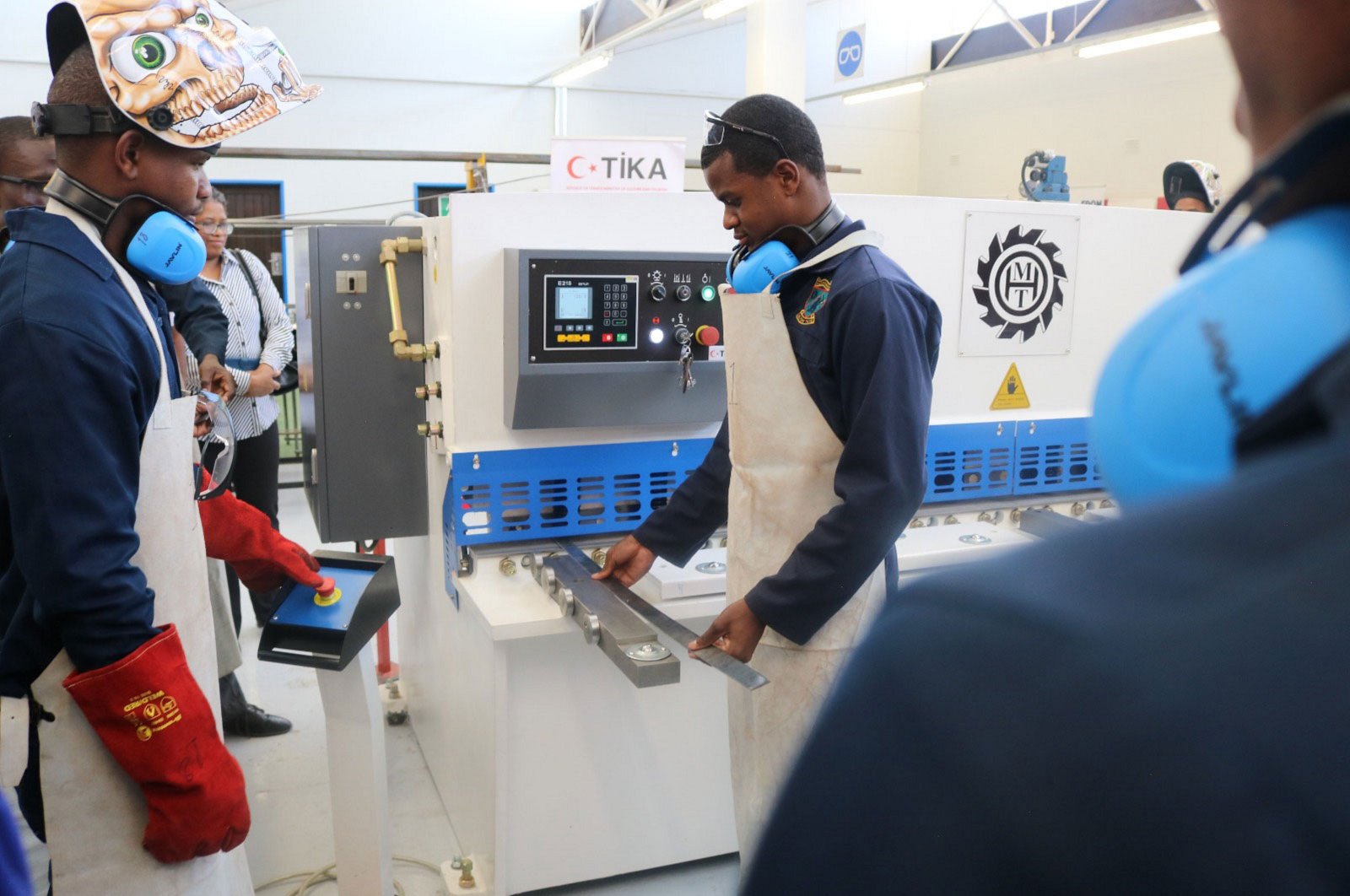 Staff inspect the refurbished metalworking workshop at Pionier Boys&#039; School, in Windhoek, Namibia, Nov. 12, 2024. (AA Photo)