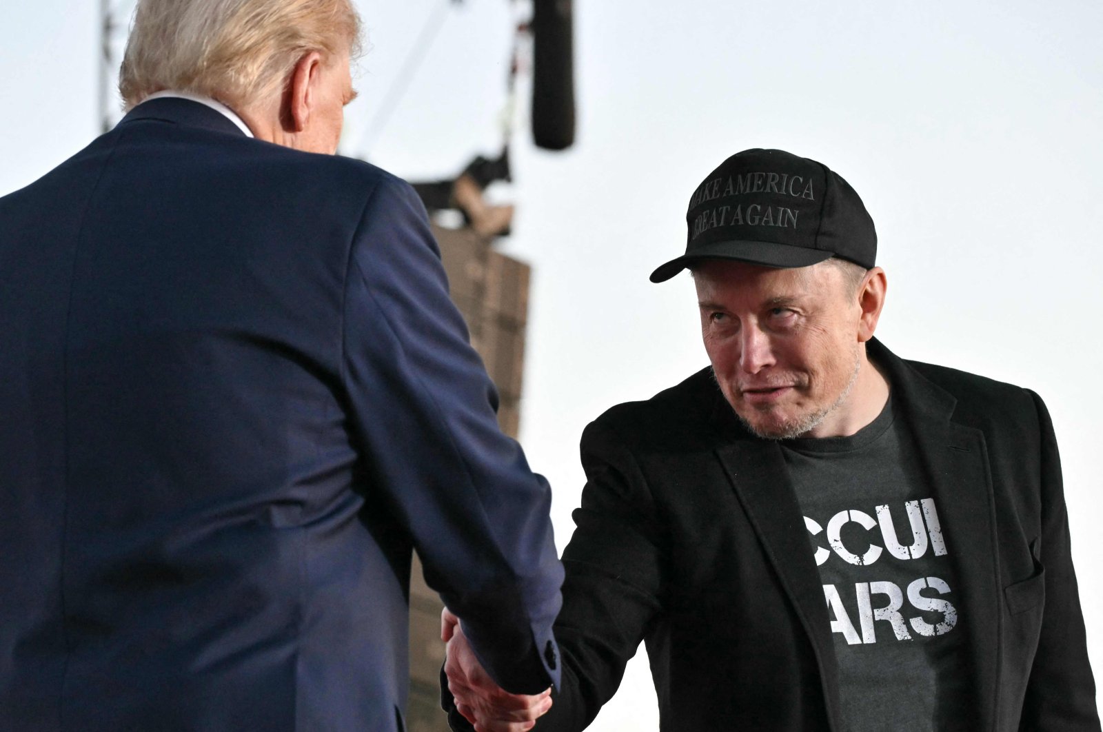 Tesla CEO Elon Musk (R) joins former U.S. President and Republican presidential candidate Donald Trump during a campaign rally at the site of his first assassination attempt in Butler, Pennsylvania, U.S., Oct. 5, 2024. (AFP Photo)