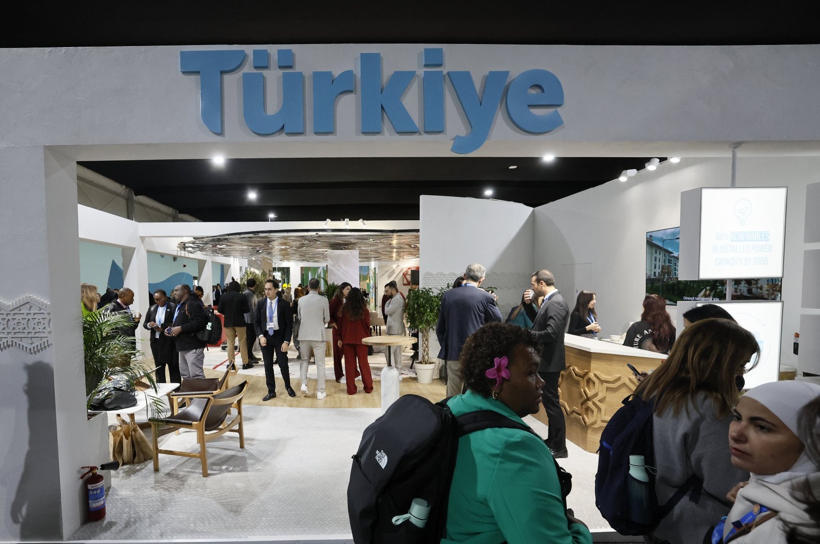 Visitors pass by the Turkish pavilion at the U.N. Climate Change Conference COP29 in Baku, Azerbaijan, Nov. 13, 2024. (EPA Photo)