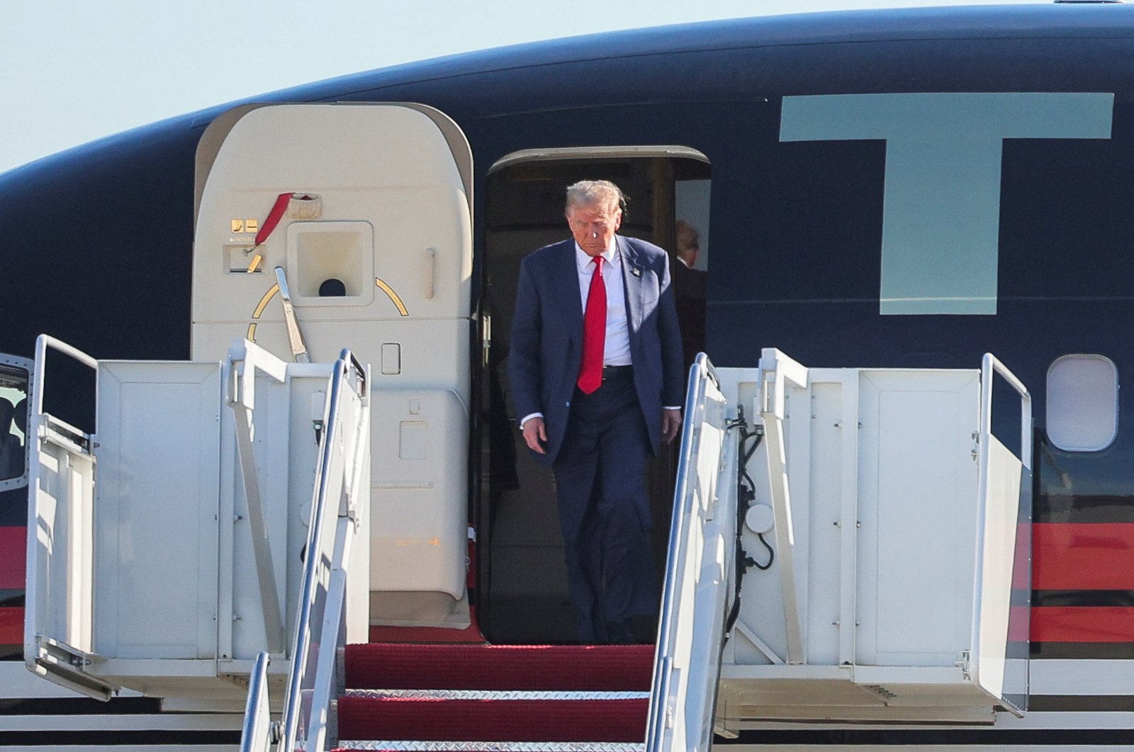 U.S. President-elect Donald Trump arrives prior to meeting with President Joe Biden and members of Congress in Washington, at Joint Base Andrews, Maryland, U.S., Nov. 13, 2024. (Reuters Photo)