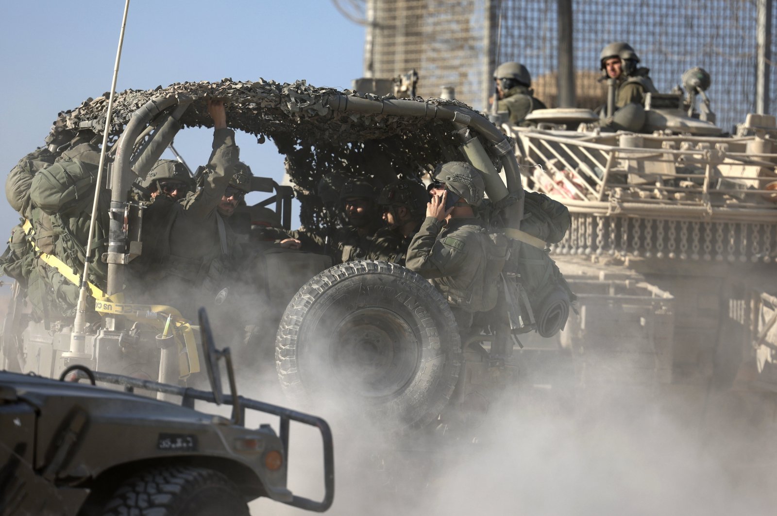 Israeli soldiers ride vehicles while patrolling the border gate during the passing of a World Food Programme (WFP) aid convoy through the Erez crossing, Gaza Strip, Palestine, Nov. 11, 2024. (EPA Photo)