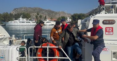 The Turkish coast guard picks up a life raft carrying 27 irregular migrants off the coast of western Muğla province, Türkiye, Nov. 1, 2024. (AA Photo)