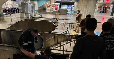 Teams work on the escalator at Yenikapı metro station after the fire, Istanbul, Türkiye, Nov. 14, 2024. (AA Photo) 
