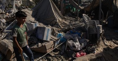Palestinians inspect the damage following Israeli shelling at a camp housing internally displaced people in Khan Younis, southern Gaza Strip, Palestine, Nov. 13, 2024. (EPA Photo)