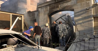 Syrian security forces inspect the damage at the scene of an airstrike in the Al-Mazzeh neighborhood, Damascus, Syria, Nov. 14, 2024. (EPA Photo)