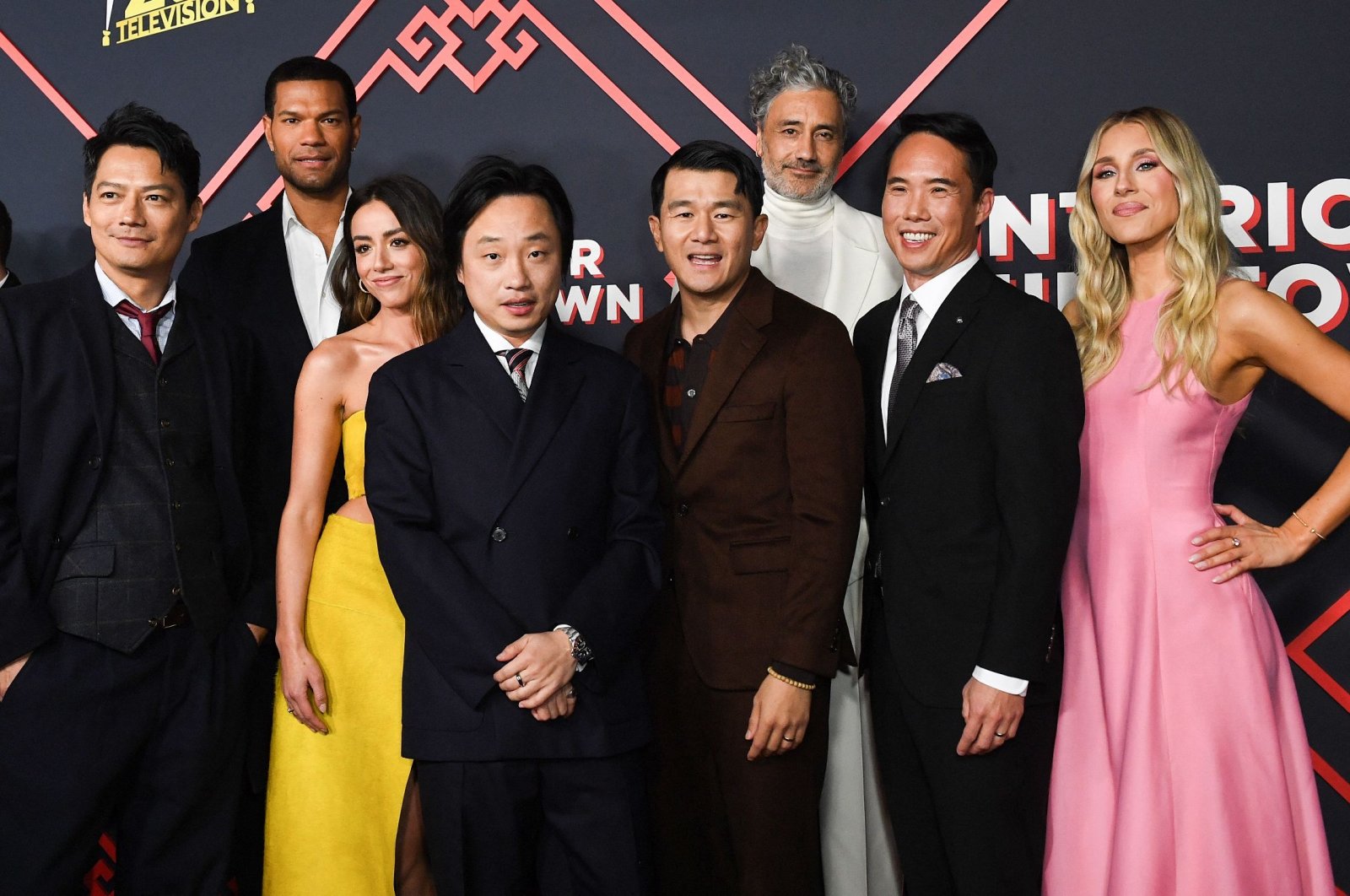 From left to right, actors Archie Kao, Sullivan Jones, Chloe Bennet, Jimmy O. Yang, Ronny Chieng, director Taika Waititi, creator Charles Yu and actress Lisa Gilroy attend the premiere of Hulu&#039;s &quot;Interior Chinatown,&quot; Los Angeles, U.S., Nov. 13, 2024. (AFP Photo)