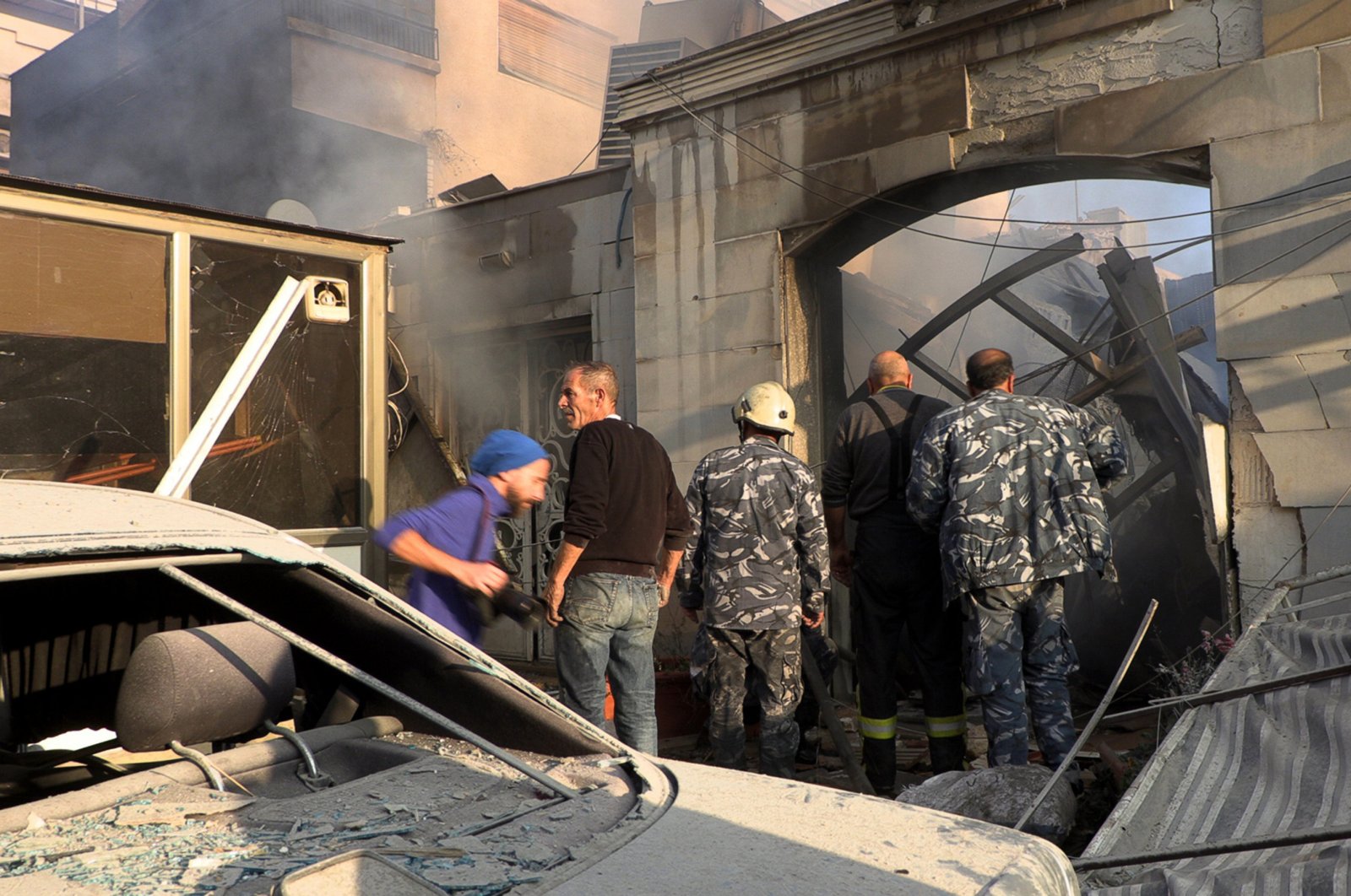 Syrian security forces inspect the damage at the scene of an airstrike in the Al-Mazzeh neighborhood, Damascus, Syria, Nov. 14, 2024. (EPA Photo)