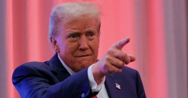 U.S. President-elect Donald Trump gestures as he meets with House Republicans on Capitol Hill in Washington, U.S., Nov. 13, 2024. (Reuters Photo)
