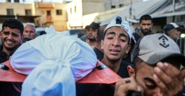 Mourners carry the body of a victim of an Israeli strike, during a funeral at al-Aqsa Martyrs Hospital, Deir Al-Balah, Gaza Strip, Palestine, Nov. 15, 2024. (AFP Photo)