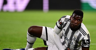 Juventus&#039; French midfielder Paul Pogba reacts after being tackled during the UEFA Europa League semifinal first-leg football match between Juventus and Sevilla, at the Juventus stadium, Turin, Italy, May 11, 2023. (AFP Photo)