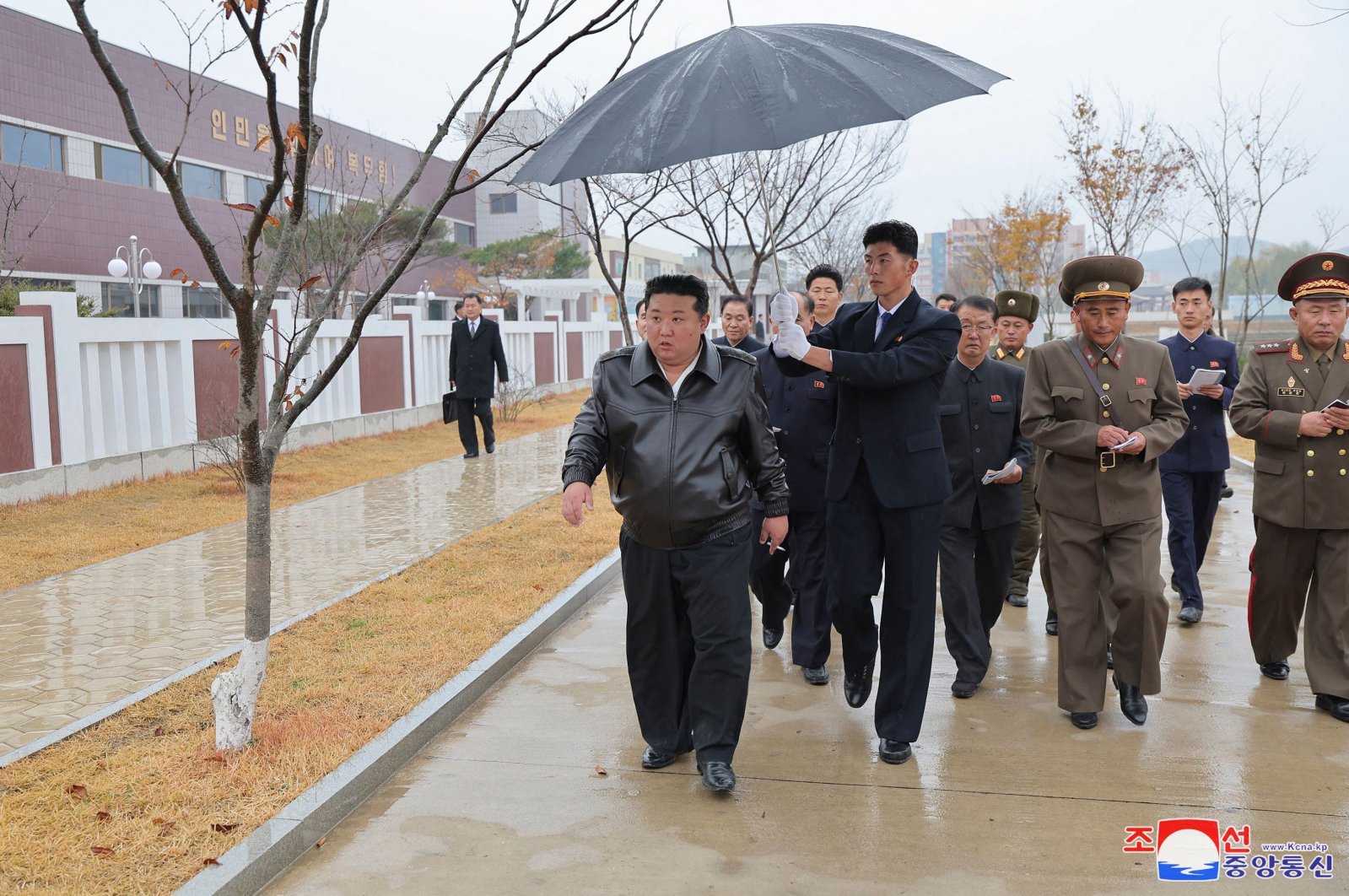 This picture released from North Korea&#039;s official Korean Central News Agency (KCNA) via KNS shows North Korean leader Kim Jong Un (C) inspecting regional-industry factories under construction in Jaeryong County, South Hwanghae Province, North Korea, Nov. 14, 2024. (AFP Photo)