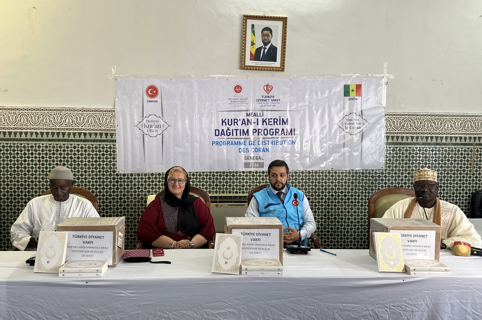 Türkiye’s Dakar Ambassador Nur Sağman (2nd L), head of Integration of Islamic Affairs and Arabic Education Graduates, Djim Drame, Religious Affairs and Social Services Counselor of the Dakar Embassy Faruk Uslu (2nd R) and Senegalese officials attend the program, Dakar, Senegal, Nov. 15, 2024. (AA Photo)