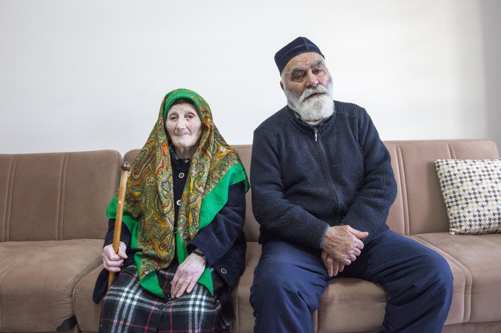 World Ahıska Turks Union President Ziyatdin Kassanov and his wife pose during an interview at their home in Ahlat, eastern Bitlis province, Türkiye, Nov. 12, 2024. (AA Photo)