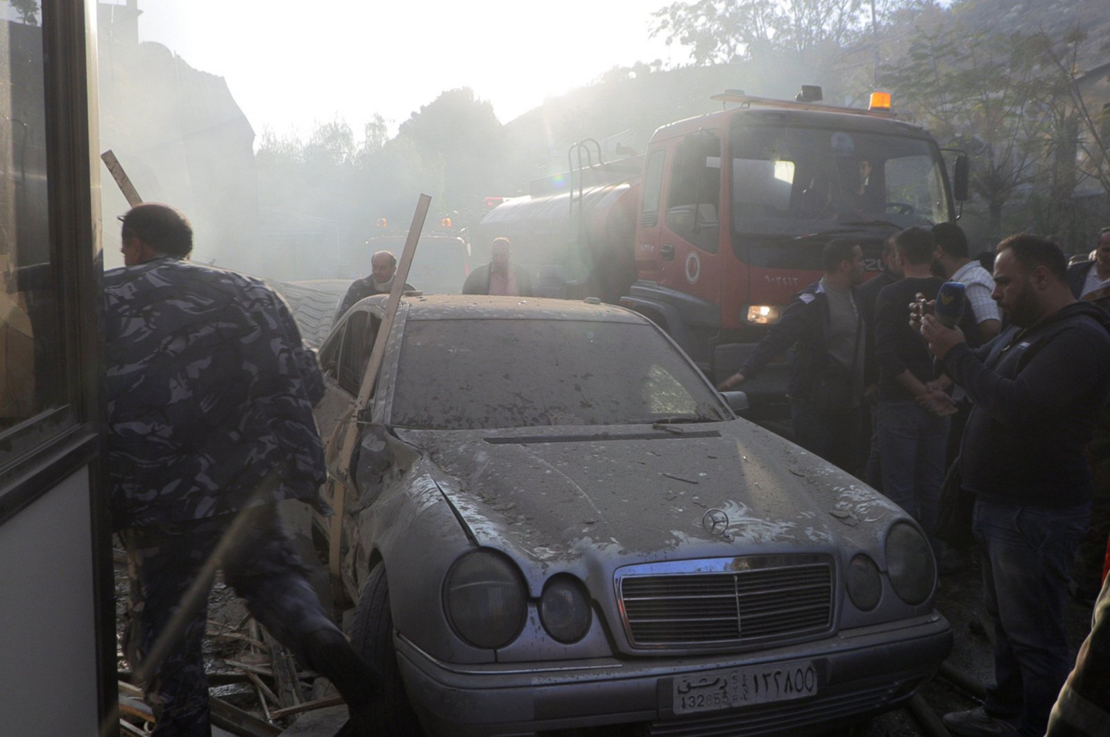 Syrian security forces inspect the damage at the scene of an airstrike in the Al-Mazzeh neighborhood, Damascus, Syria, Nov. 14, 2024. (EPA Photo)