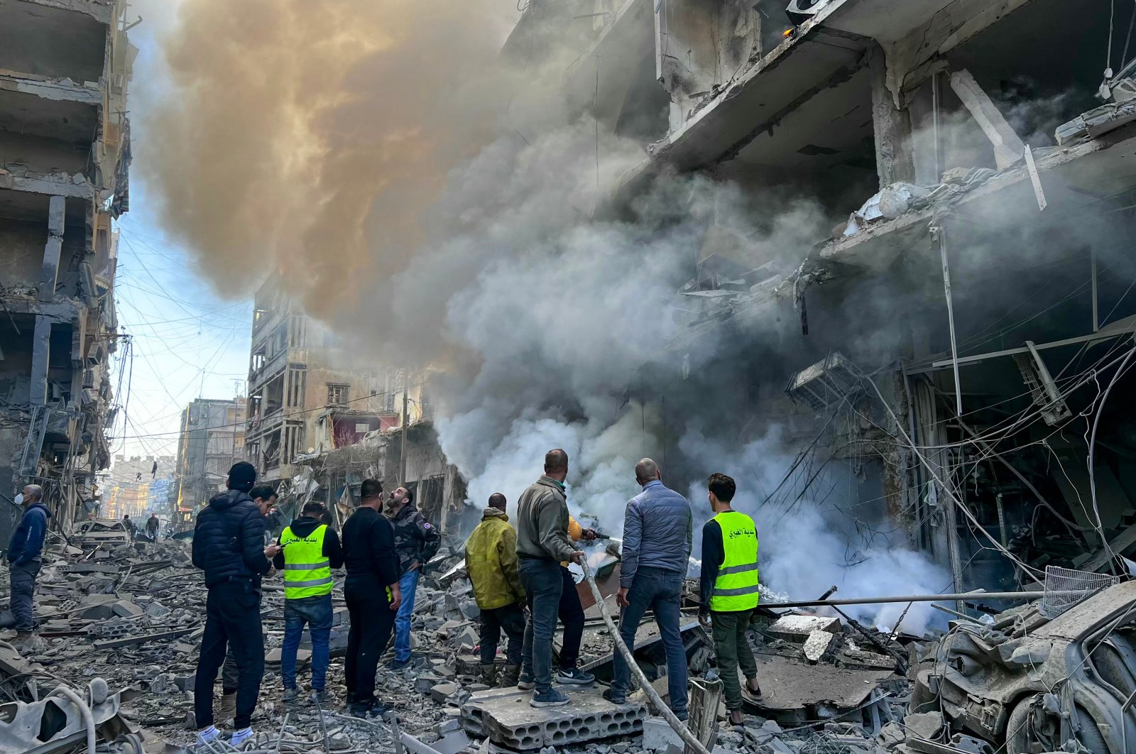 Firefighters douse a fire at the site of an Israeli airstrike in the Ghobeiry neighborhood, Beirut, Lebanon, Nov. 15, 2024. (AFP Photo)