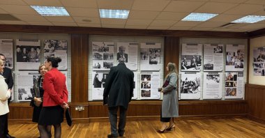 People visit the “Denktaş in London” exhibition in London, U.K., Nov. 16, 2024. (AA Photo)