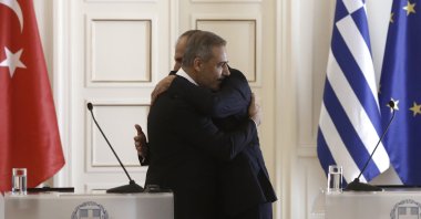 Greek Foreign Minister Giorgos Gerapetritis (R) embraces Foreign Minister Hakan Fidan (L) after their meeting, Athens, Greece, Nov. 8, 2024. (EPA Photo)