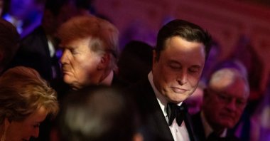 U.S. President-elect Donald Trump walks by Elon Musk during the America First Policy Institute (AFPI) gala at Mar-A-Lago in Palm Beach, Florida, U.S., Nov. 14, 2024. (Reuters Photo)