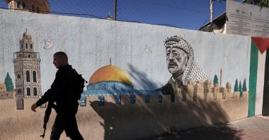 A Palestinian Authority policeman walks outside a police station, Hebron, West Bank, Palestine, Nov. 11, 2024. (AFP Photo)